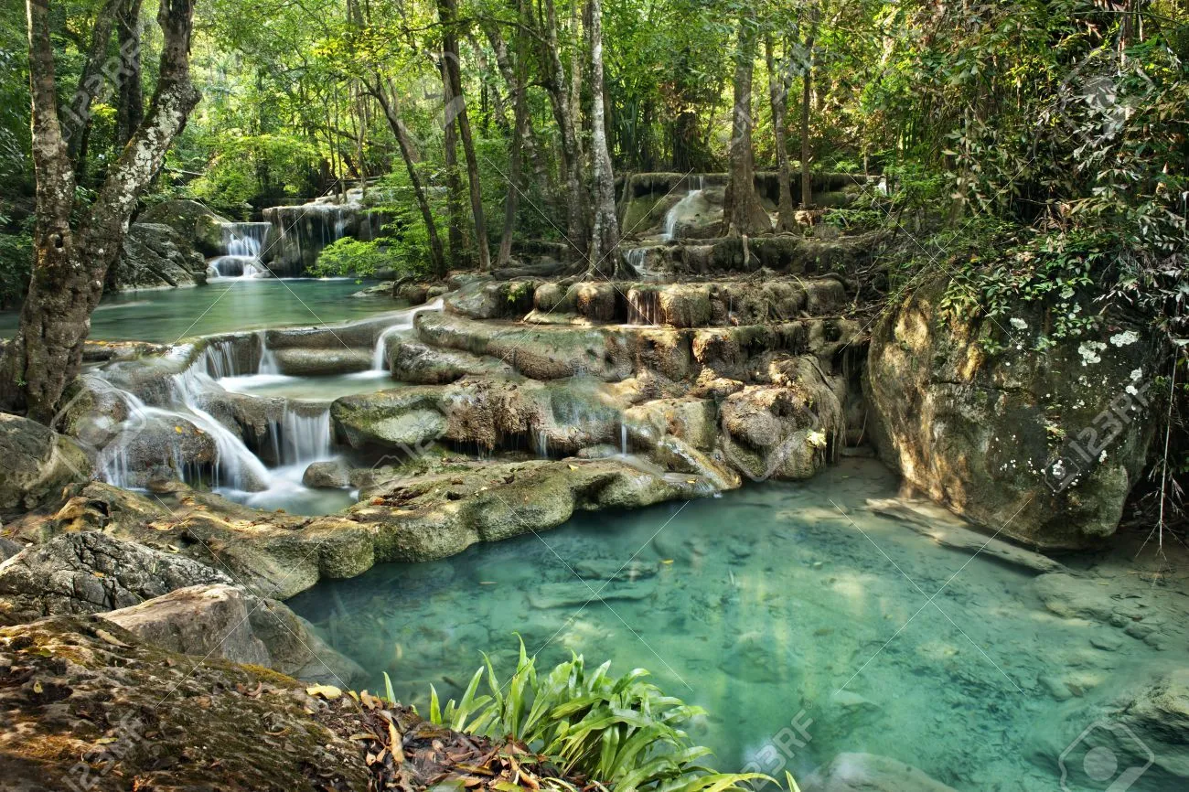 Waterfall In Erawan National Park , Kanchanaburi , Thailand Stock ... | Erawan  national park, Thailand vacation, National parks