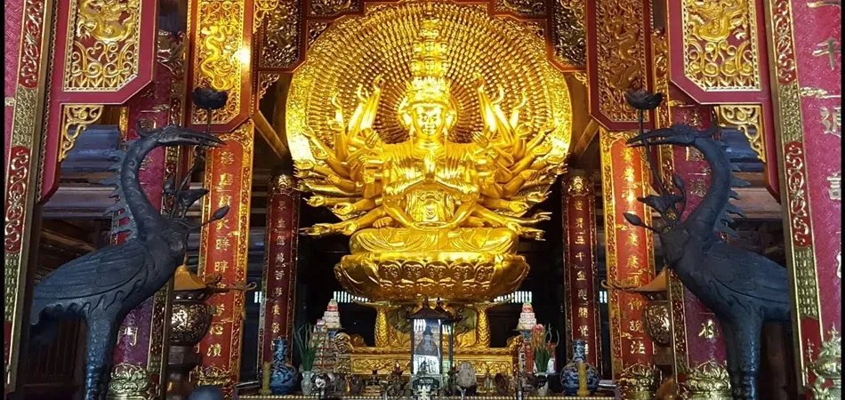 Buddha statue with thousand eyes and thousand ears at Bai Dinh pagoda in Ninh Binh