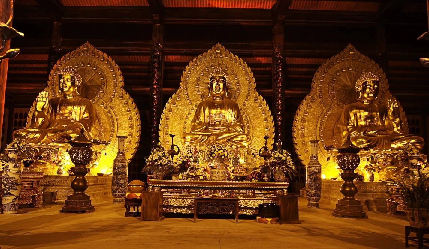 Majestic Buddha statue inside Bai Dinh pagoda, in Ninh Binh tourism