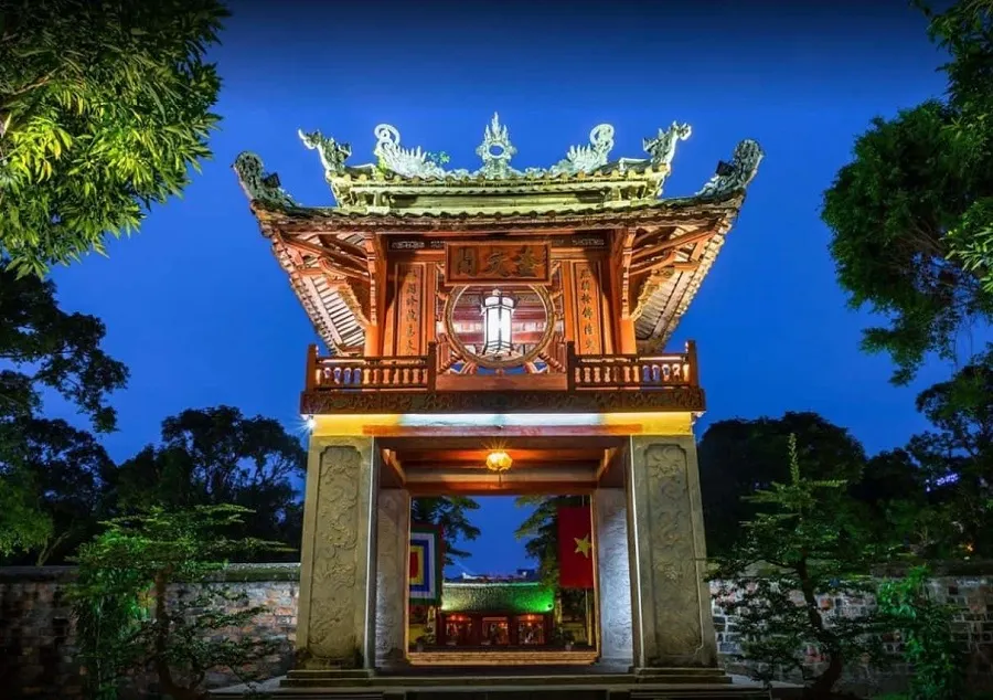 The Temple of Literature sparkles mysteriously at night
