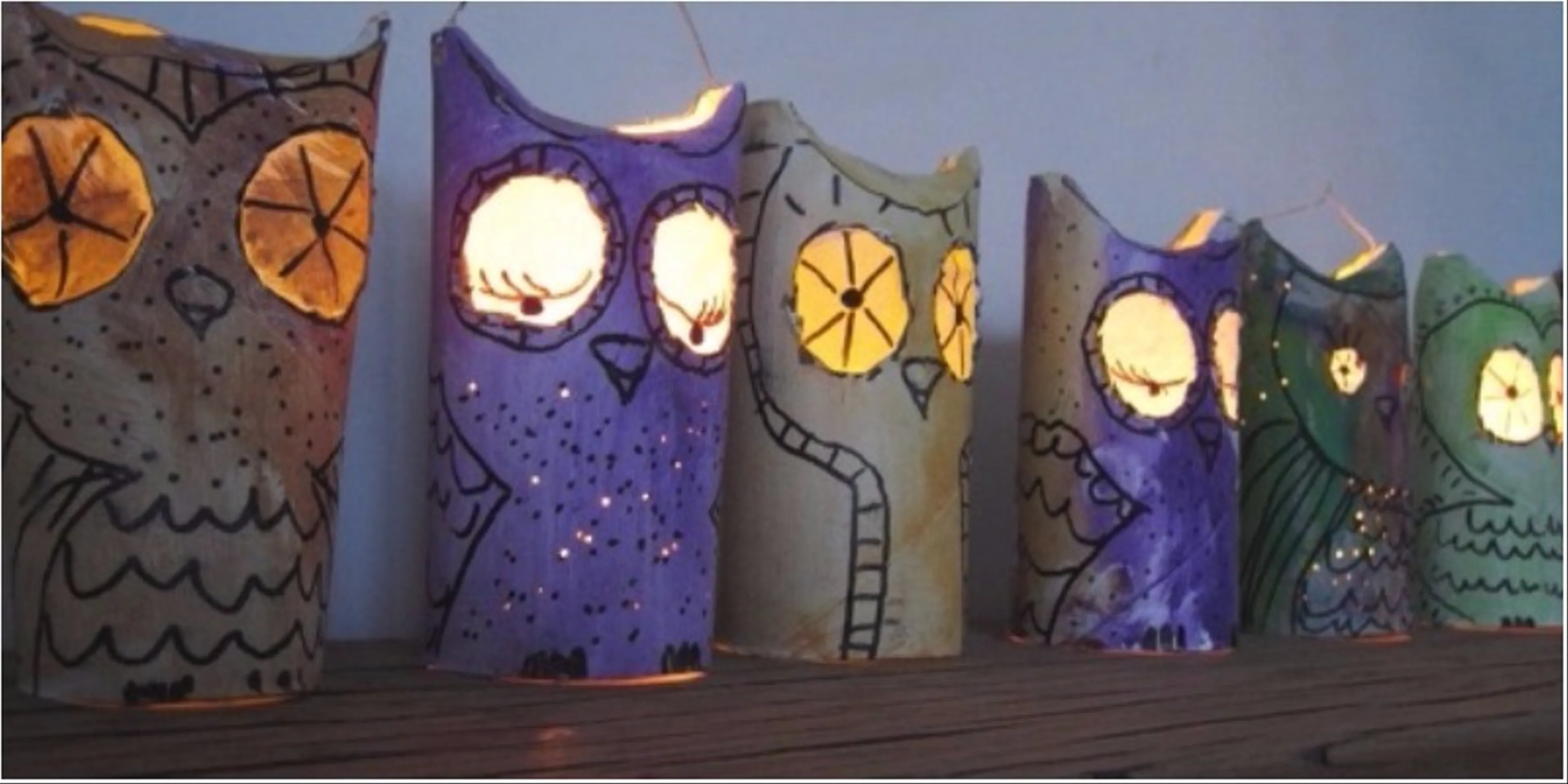 Recycle old paper cores into owl-faced lanterns for Halloween