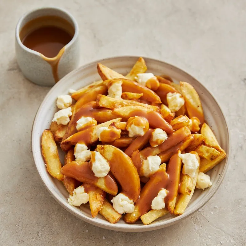Nguồn Gốc Và Lịch Sử Của Poutine