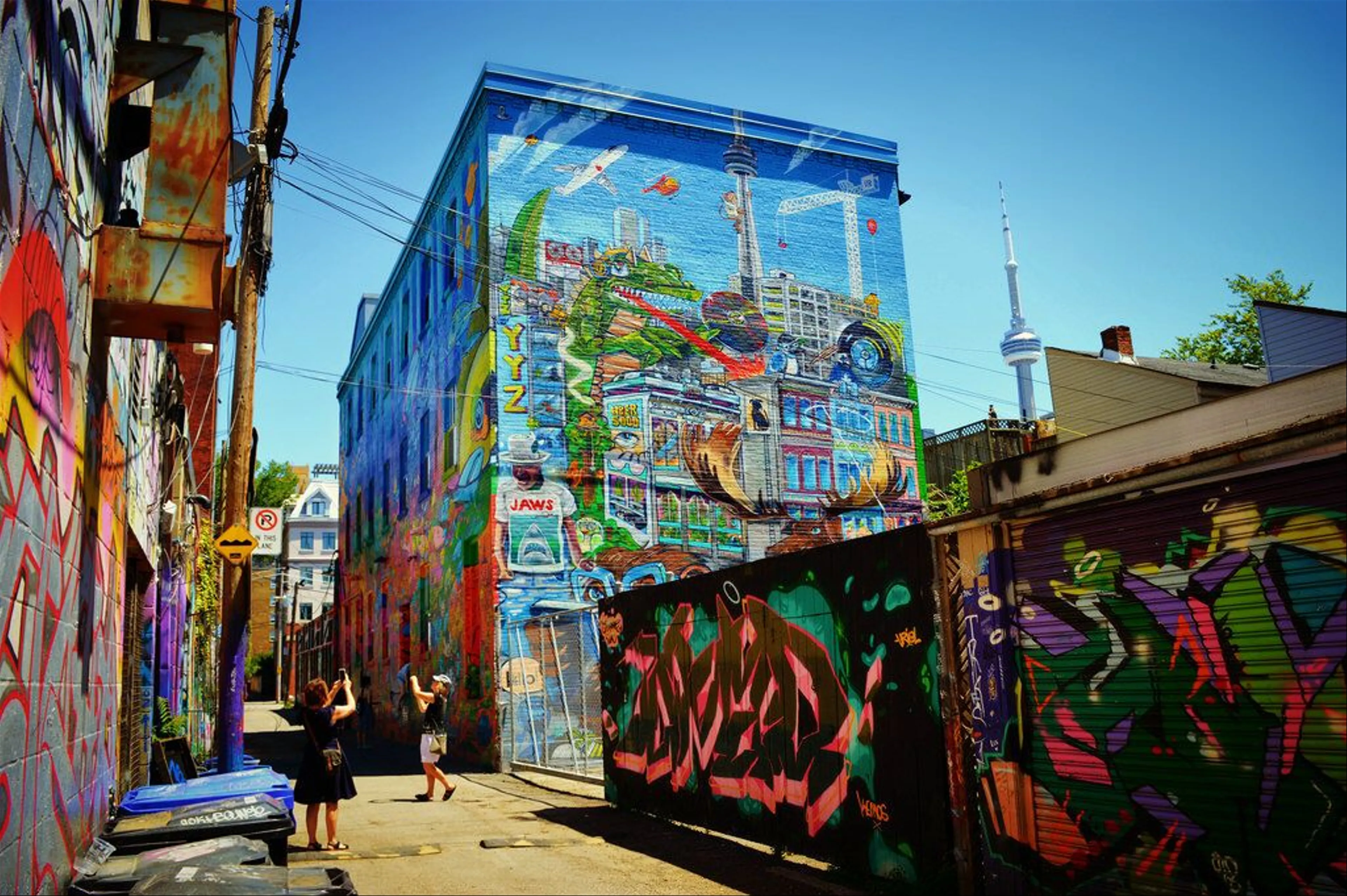 Discover the Hidden Murals of Toronto’s Graffiti Alley: A Colorful Urban Adventure