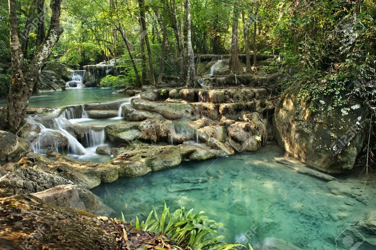 Waterfall In Erawan National Park , Kanchanaburi , Thailand Stock ... | Erawan national park, Thailand vacation, National parks