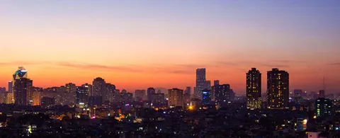 Hanoi is growing and modernizing. New flats and commercial houses are built.