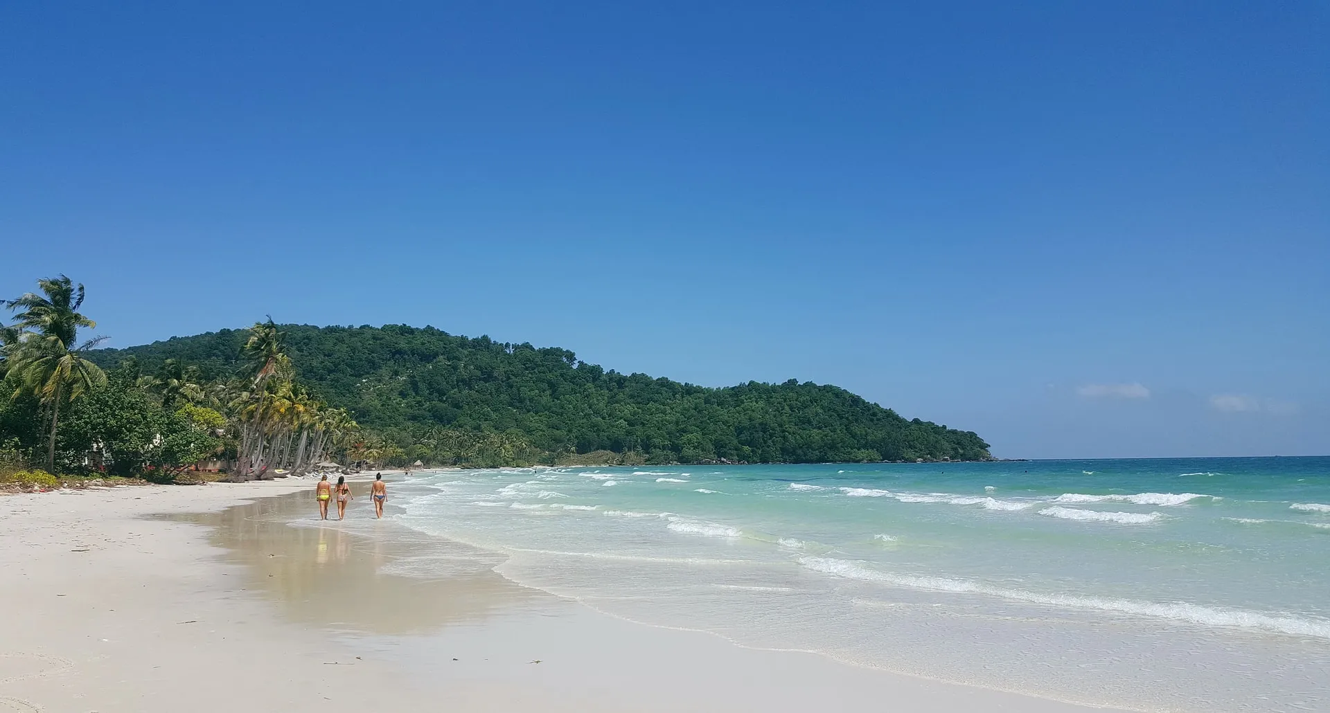 a beach in phu quoc with blue skies