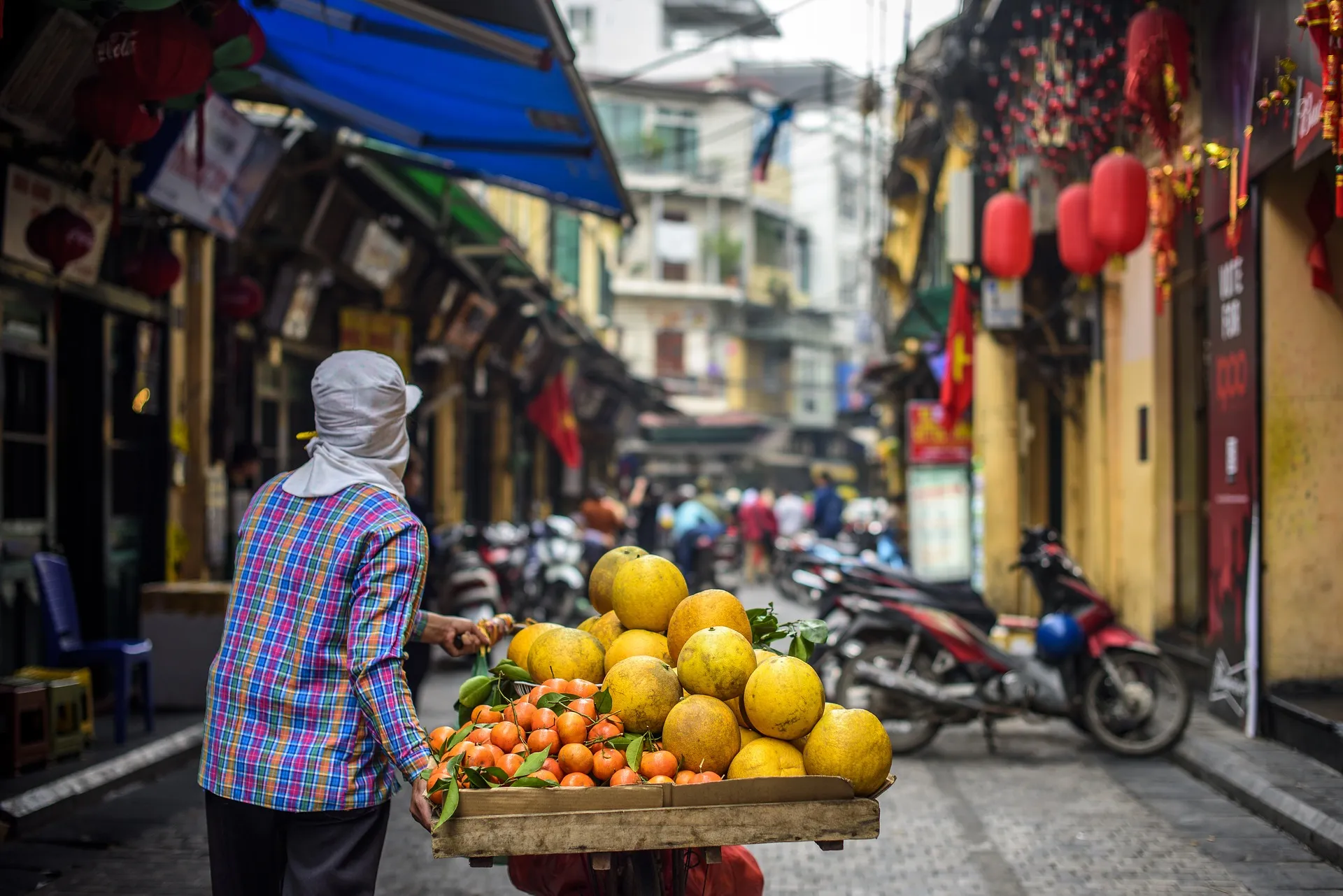 Woman selling fruits in Old Quarter