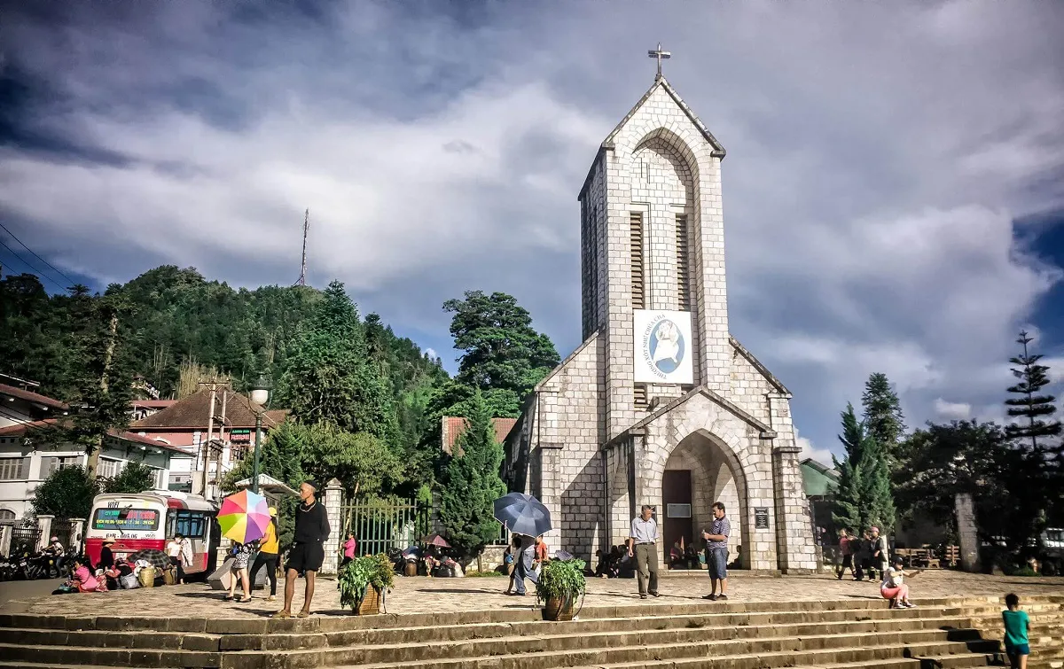 Tourists come to visit SaPa ancient church
