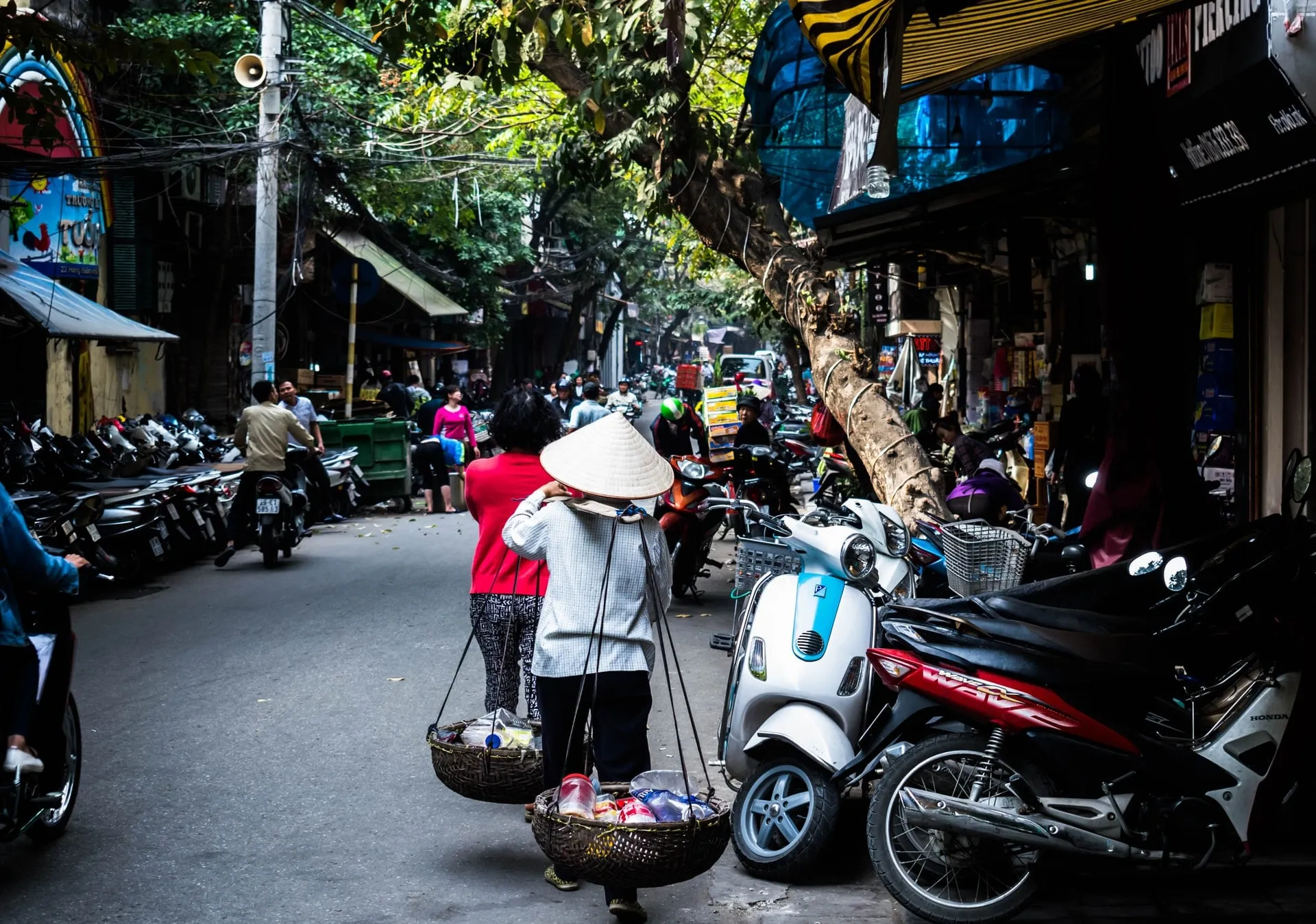 Vietnam street with shops and vendors