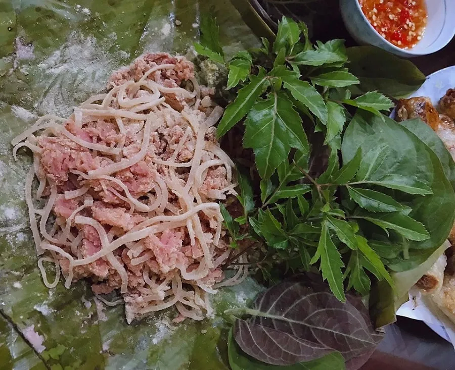 Nem chua is mixed with mushrooms