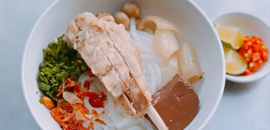 The highlight of the noodle soup dish is the fatty pork trotters