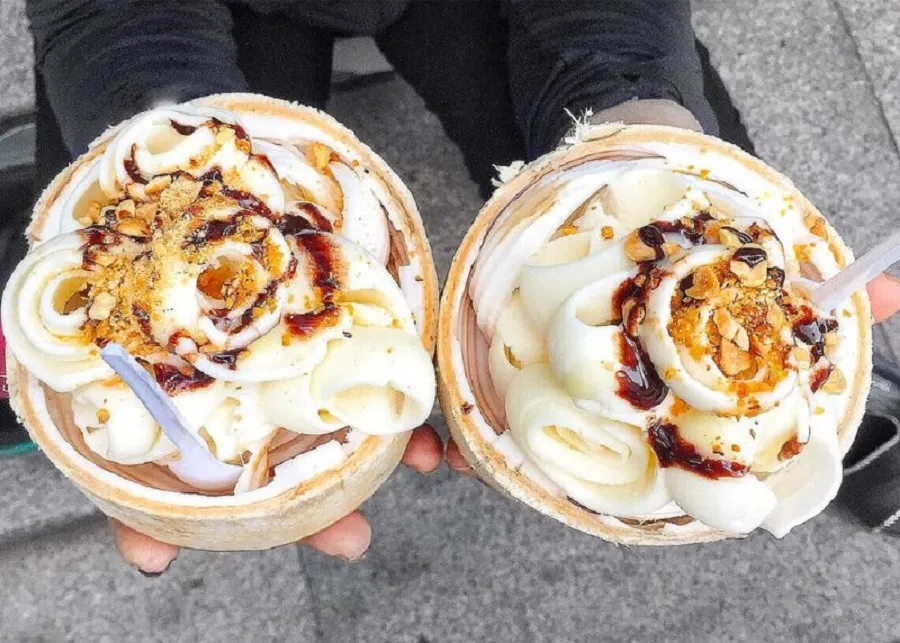 Coconut cream is sprinkled with a layer of rich peanuts