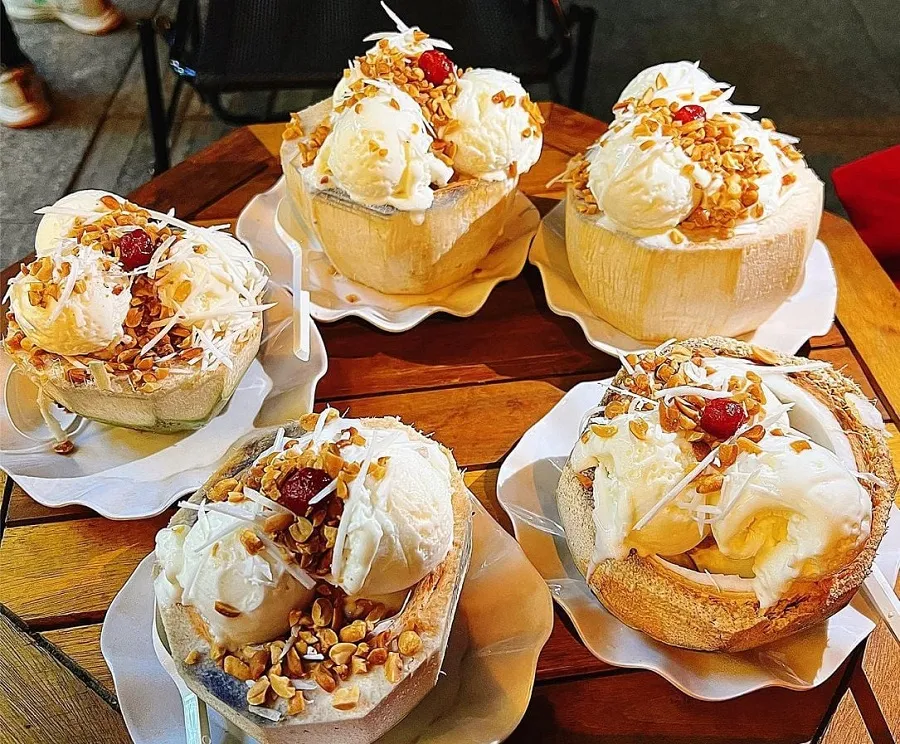 The ice cream is placed in a unique coconut