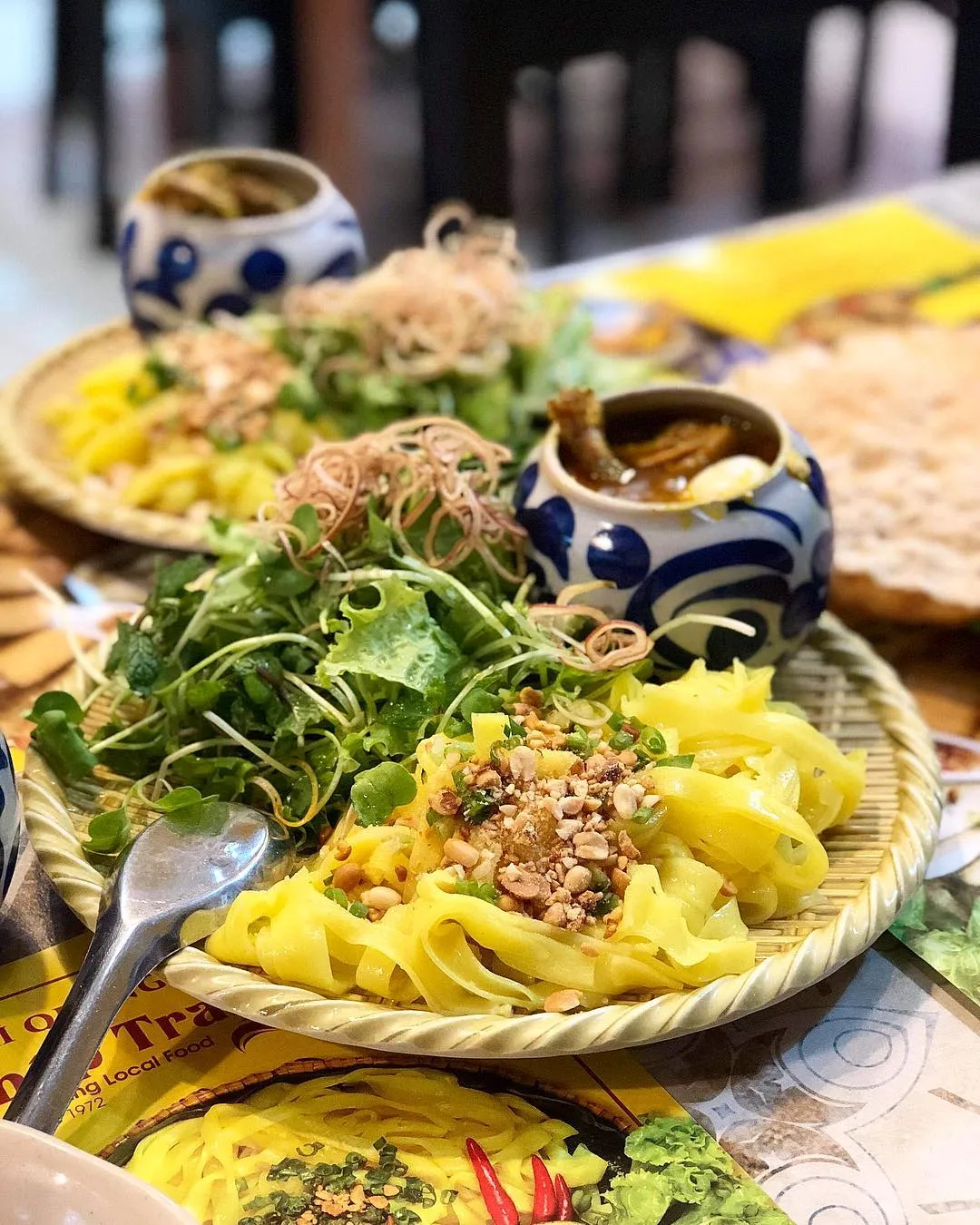 You should try Quang Ech Noodles at least once