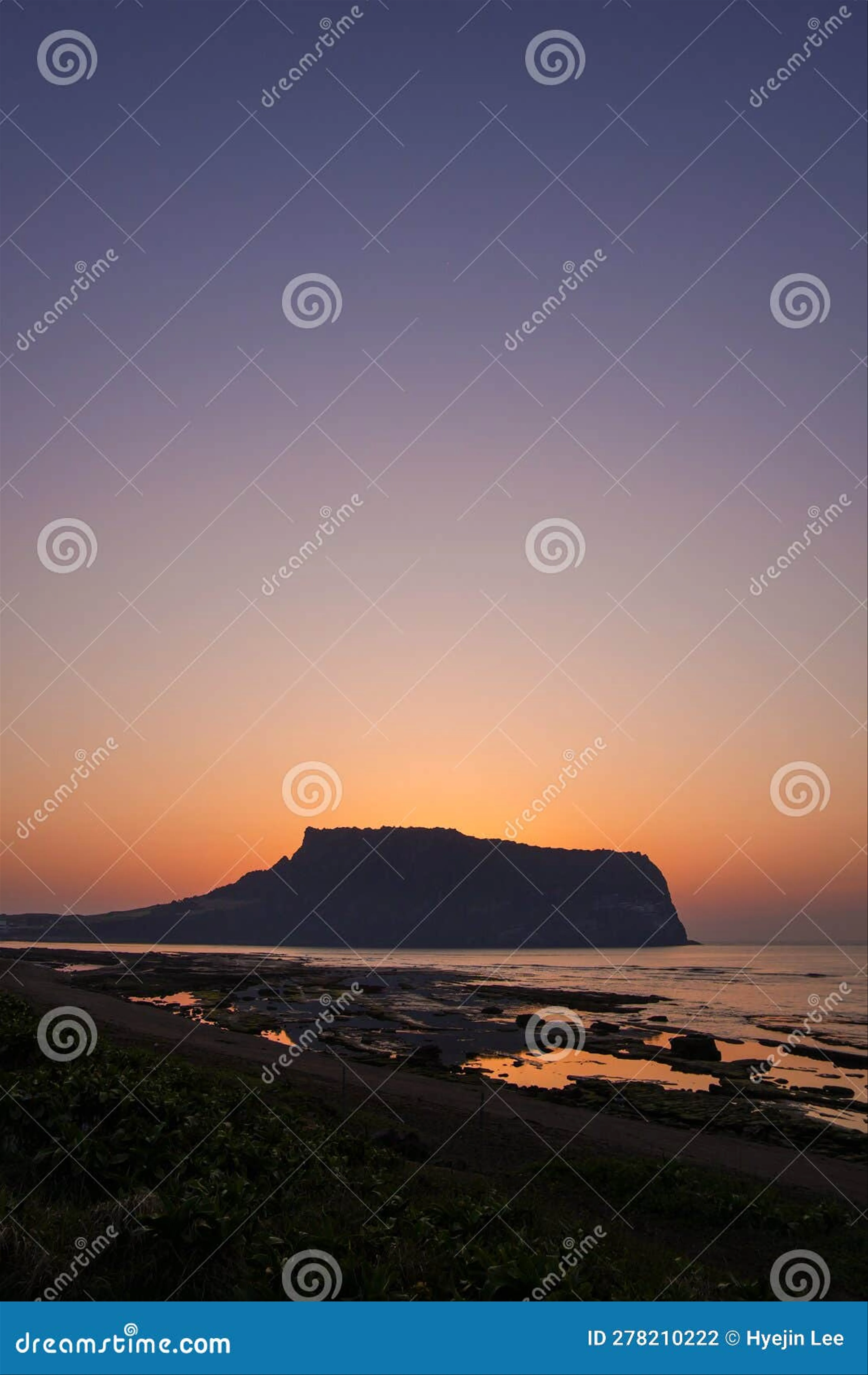Discover the Tranquil Beauty of Jeju Island's Seongsan Ilchulbong at Sunrise