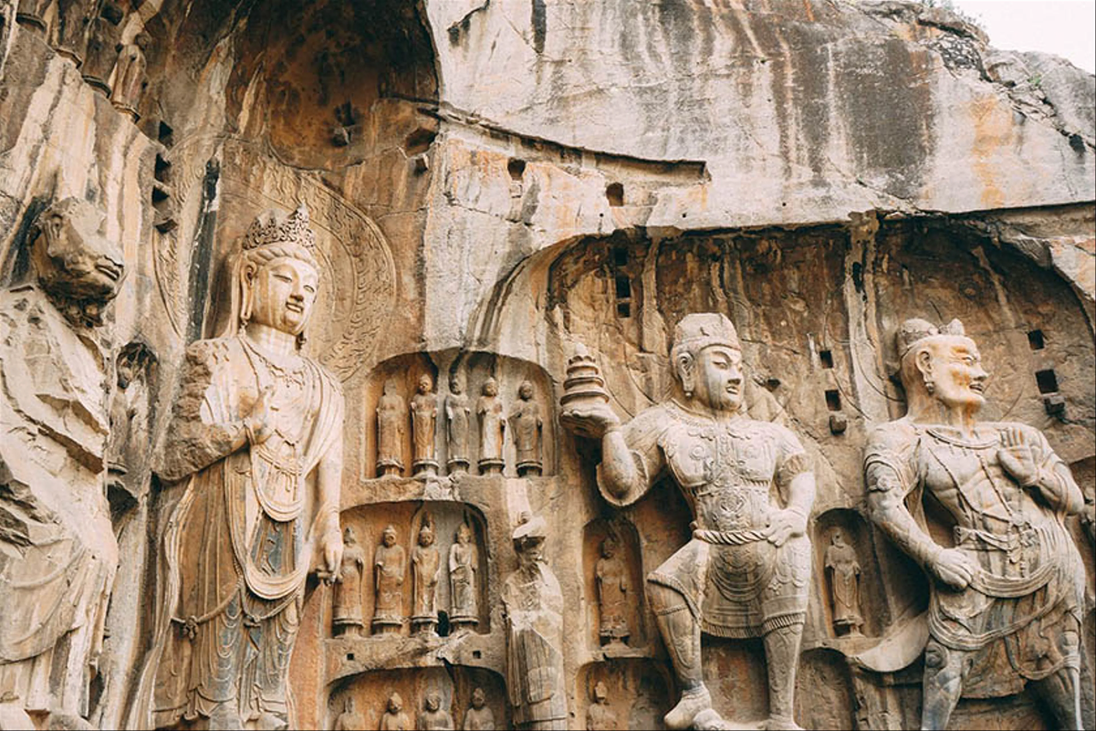Uncover the Mysteries of the Ancient Longmen Grottoes in Luoyang